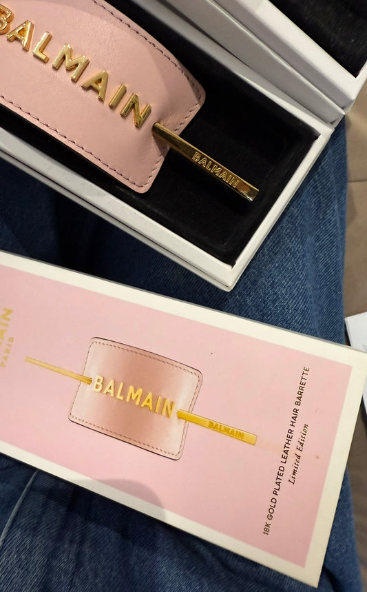 Klamra ze złotym napisem